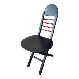 Chaise pliante années 80 rouge et noir
