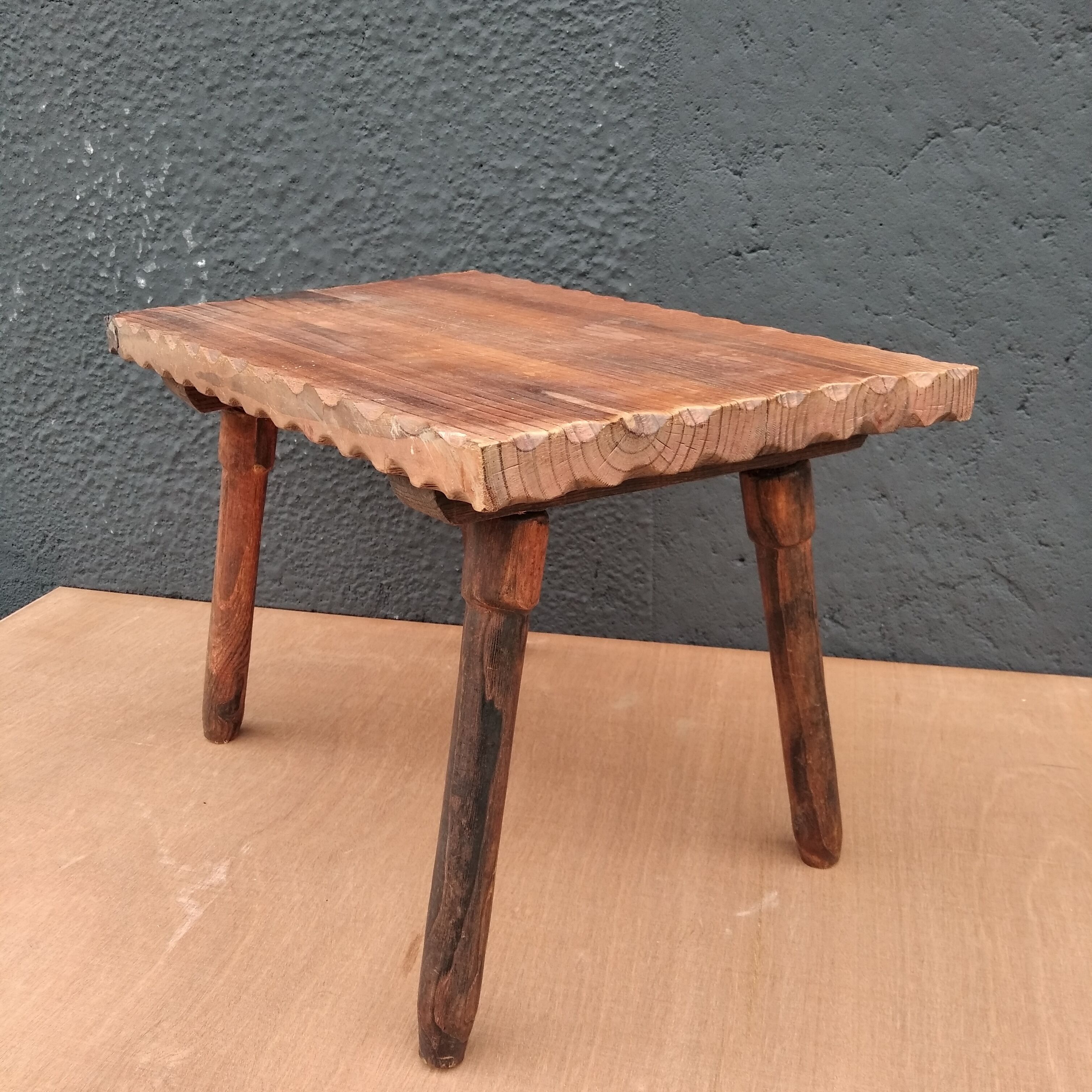 Raw hammered side table