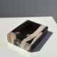 Symmetrical multicolored petrified wood soap dish