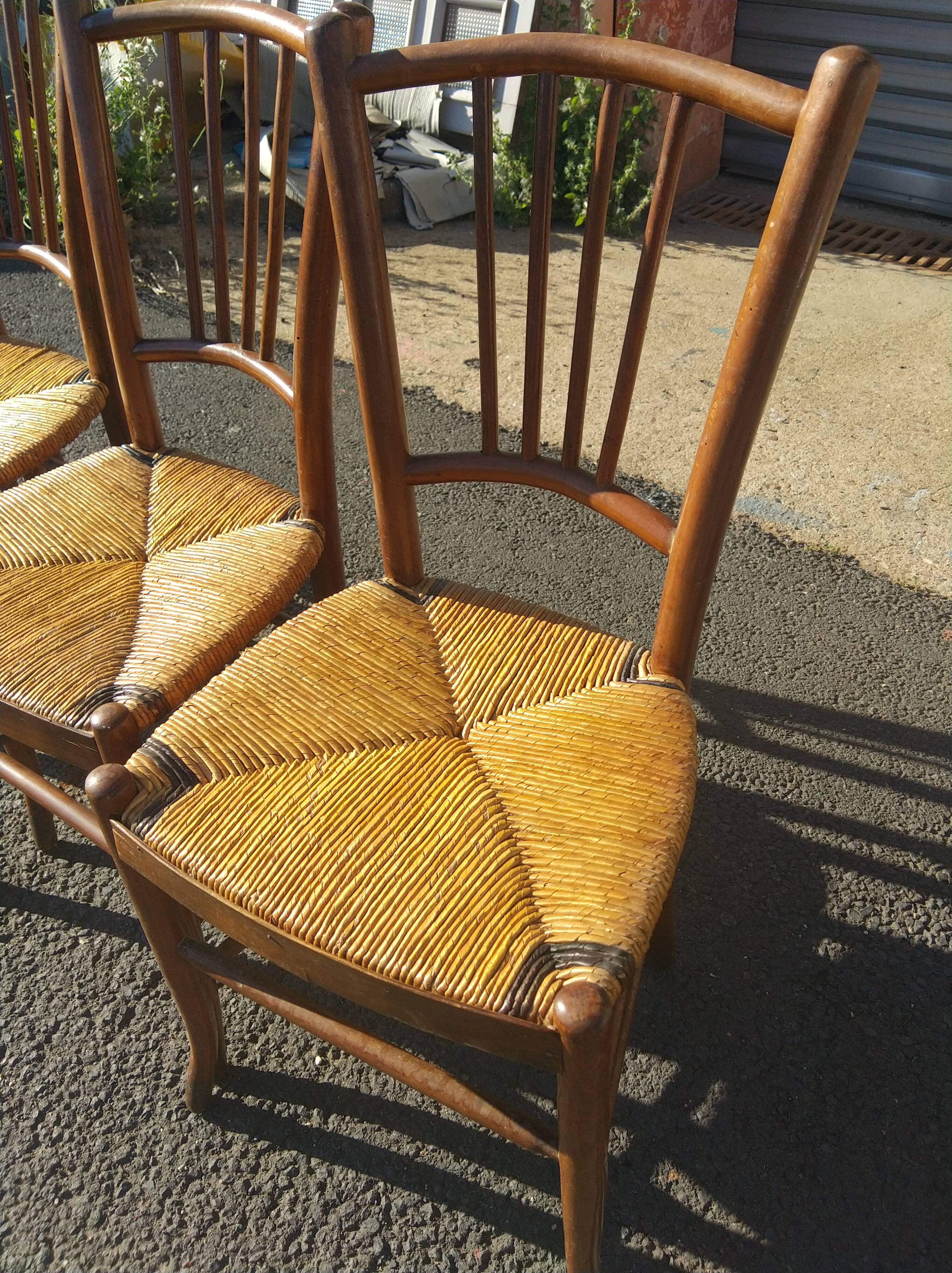 Set of 4 straw-seated bistro chairs
