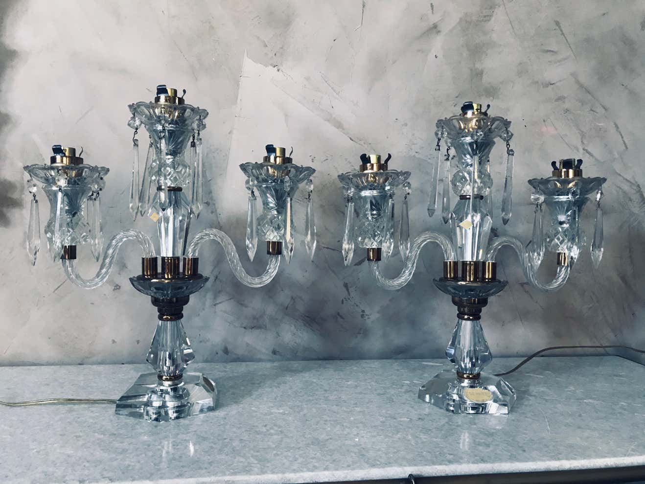 Pair of Sèvres candelabra in crystal and brass of the 20th century France 1950