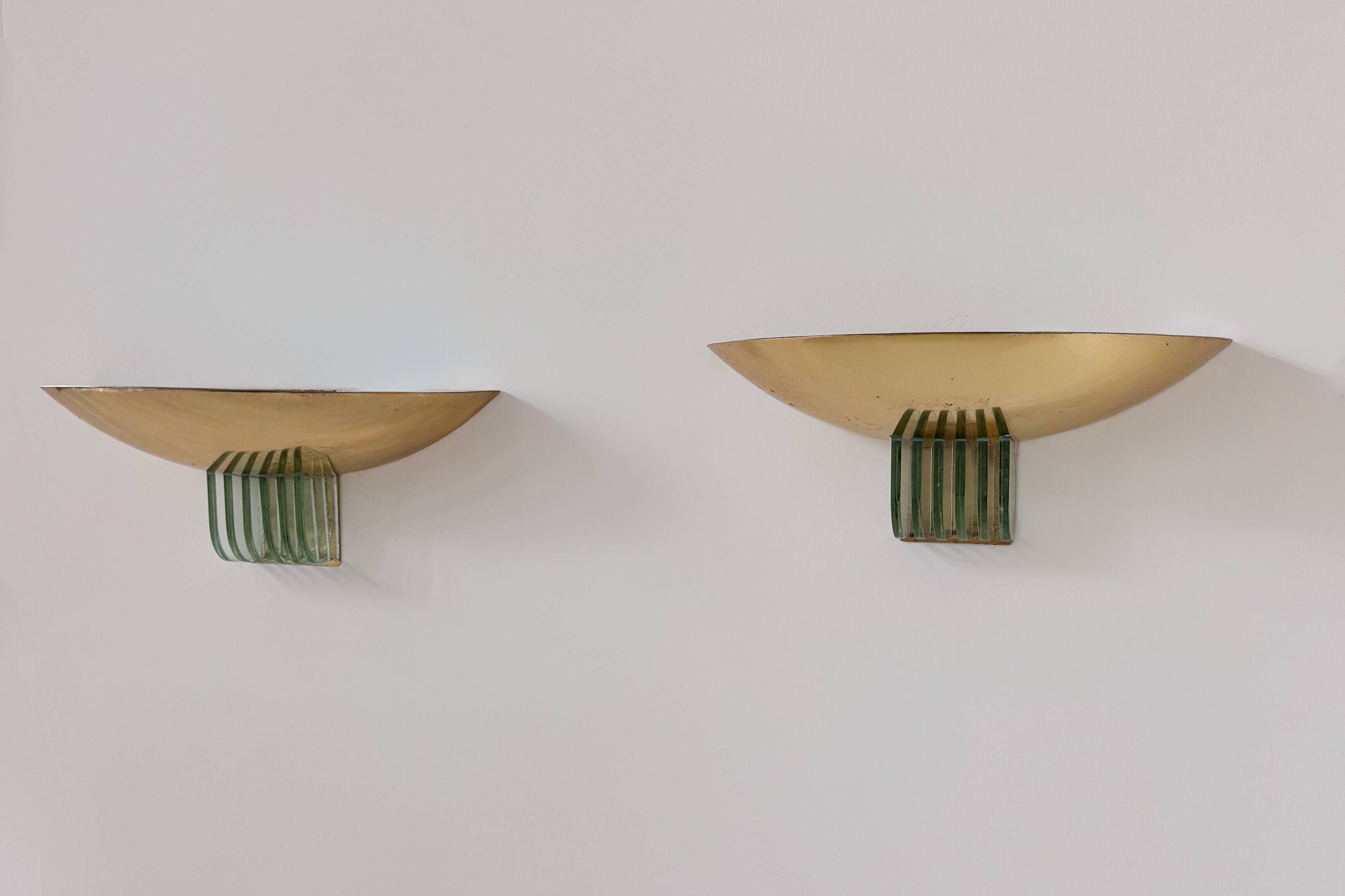 Pair of vintage brass and glass wall lights, France 1970.