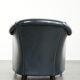 Dark blue cowhide club armchair with a unique and timeless design