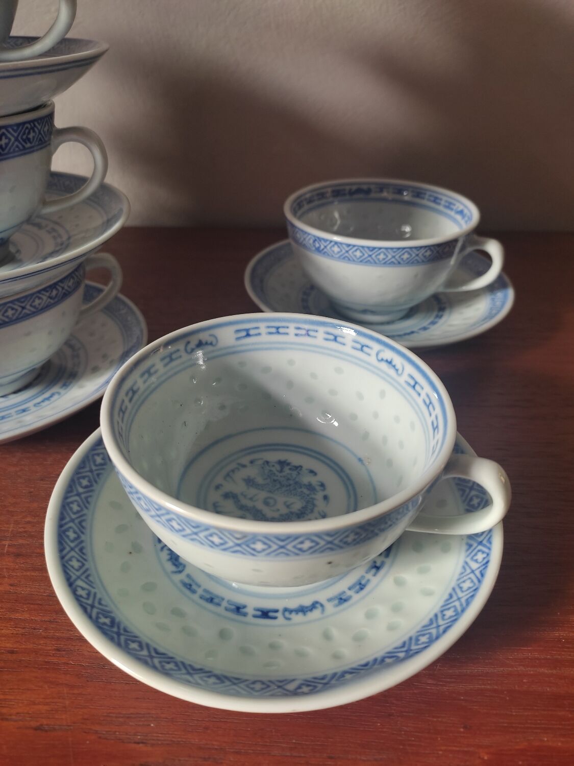 11 cups and saucers in vintage Chinese porcelain