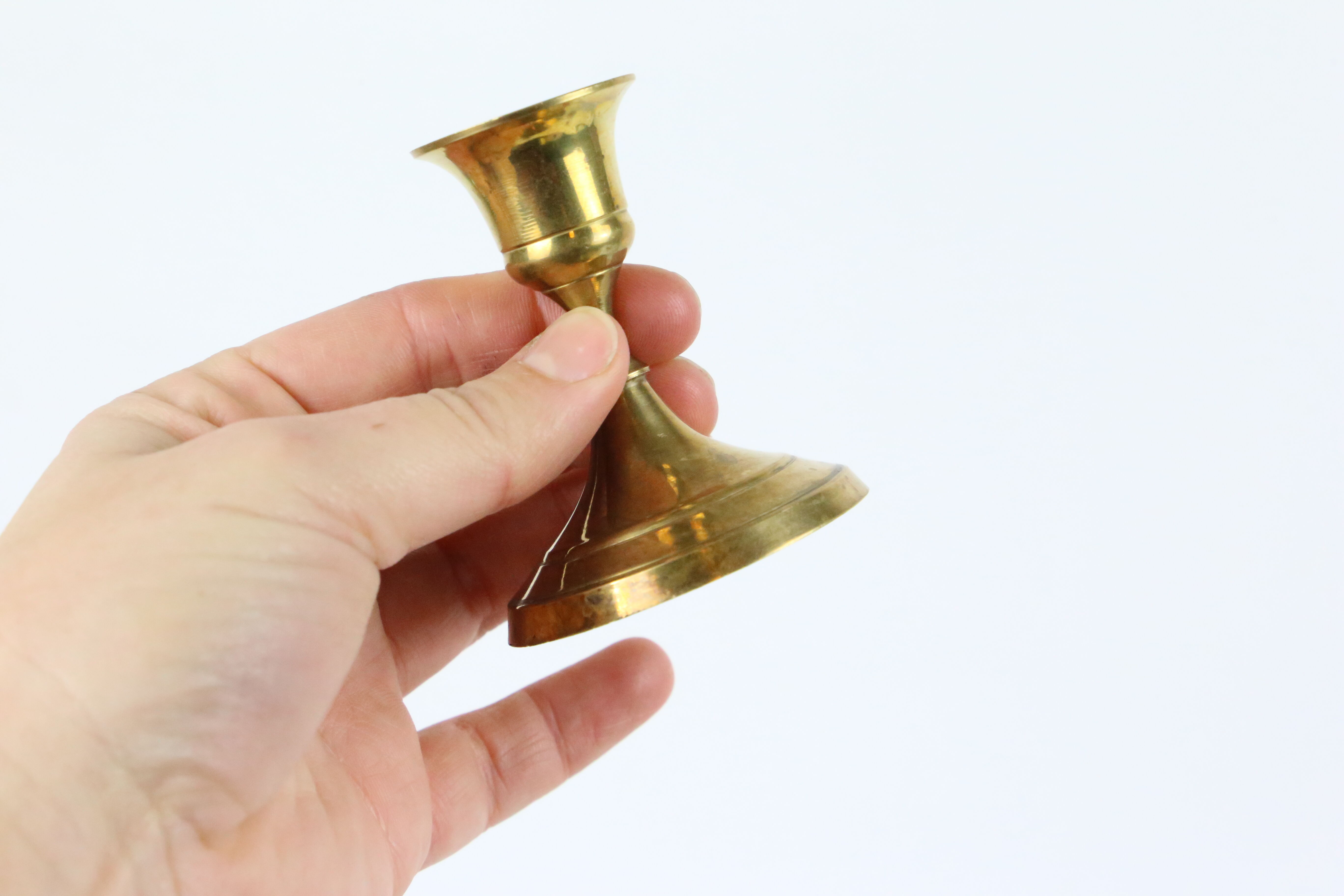 Trio of brass candle holders, vintage