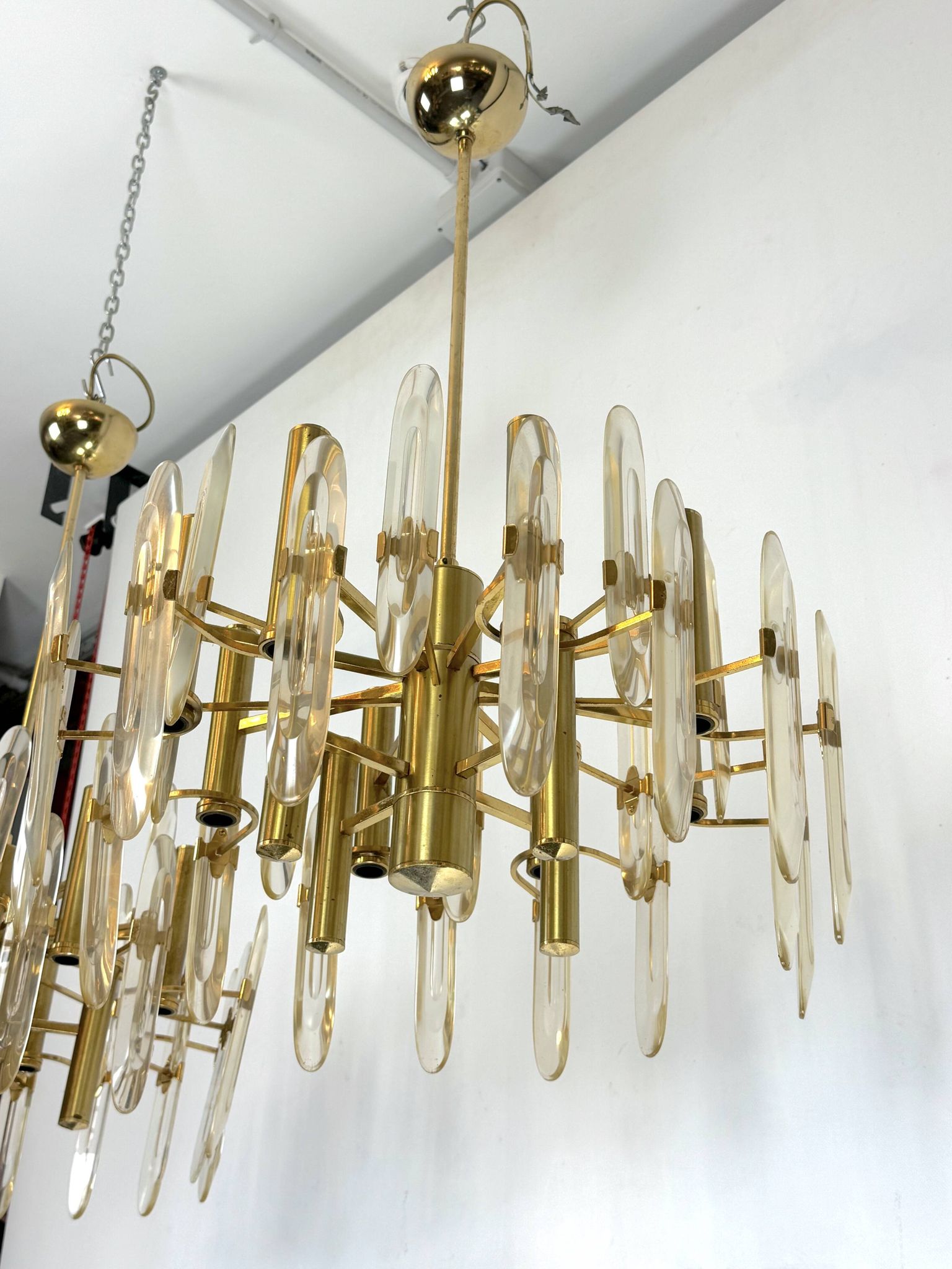 Sciolari, pair of Italian brass and glass chandeliers from 70s