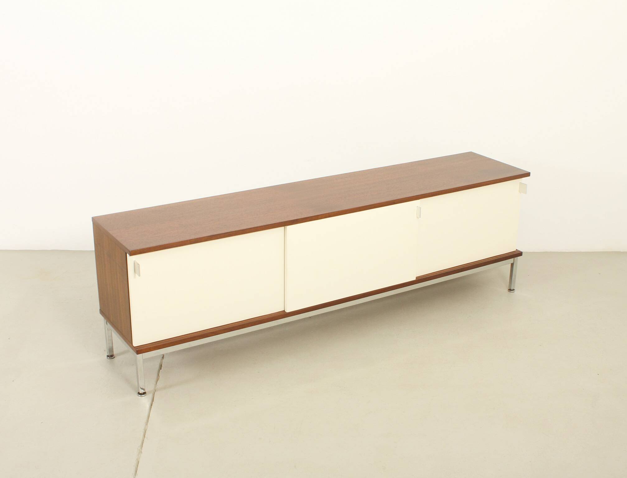 Sideboard of three sliding doors published by Airborne, France, 1960s.