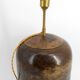 Art Deco modernist lamp in patinated brass, circa 1930.