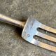 Silver and bone serving fork