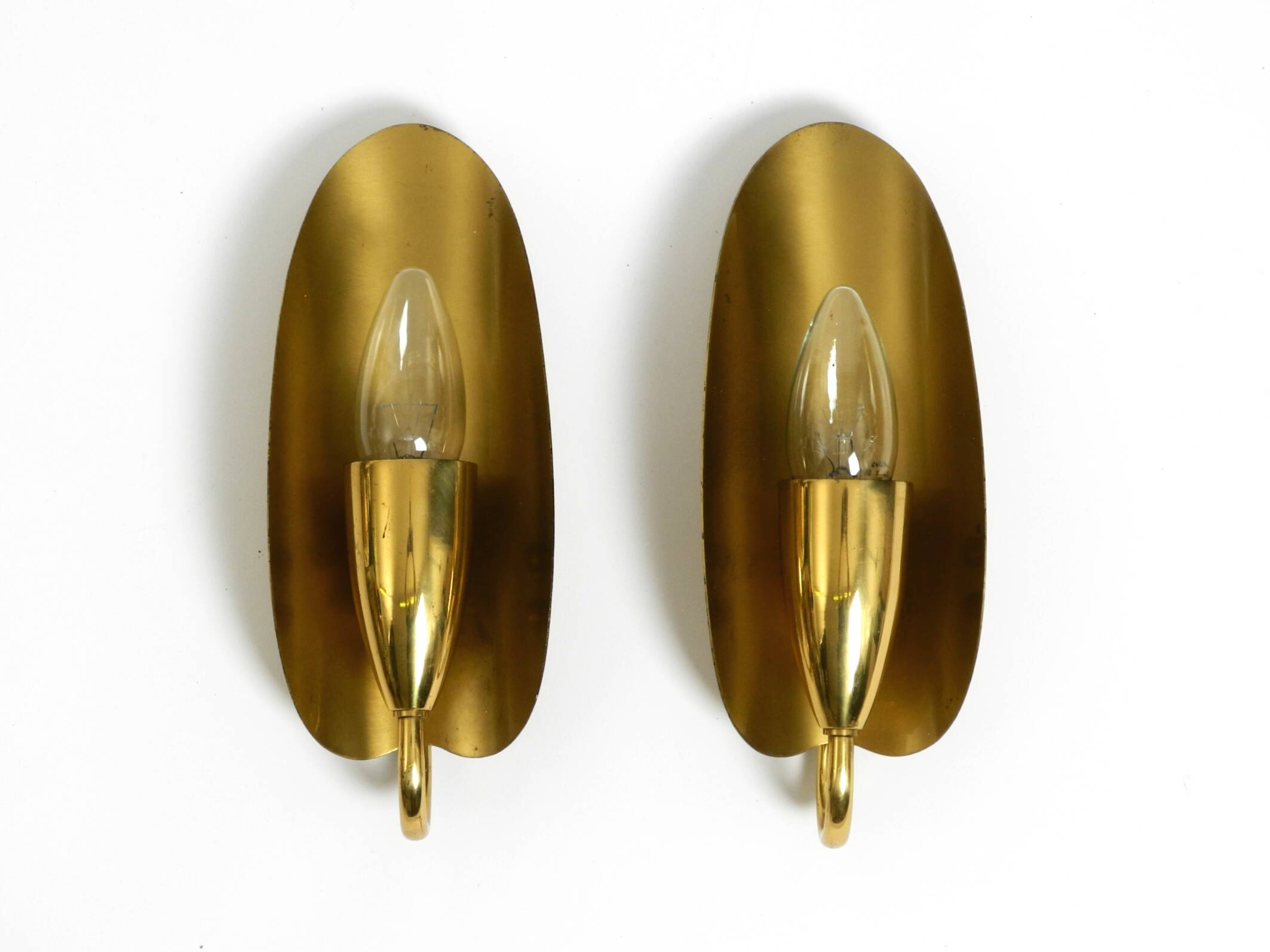 Two magical original Mid Century Modern bag brass wall lamps