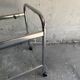 Vintage silver chrome-plated steel and glass two-tier serving trolley with wheels