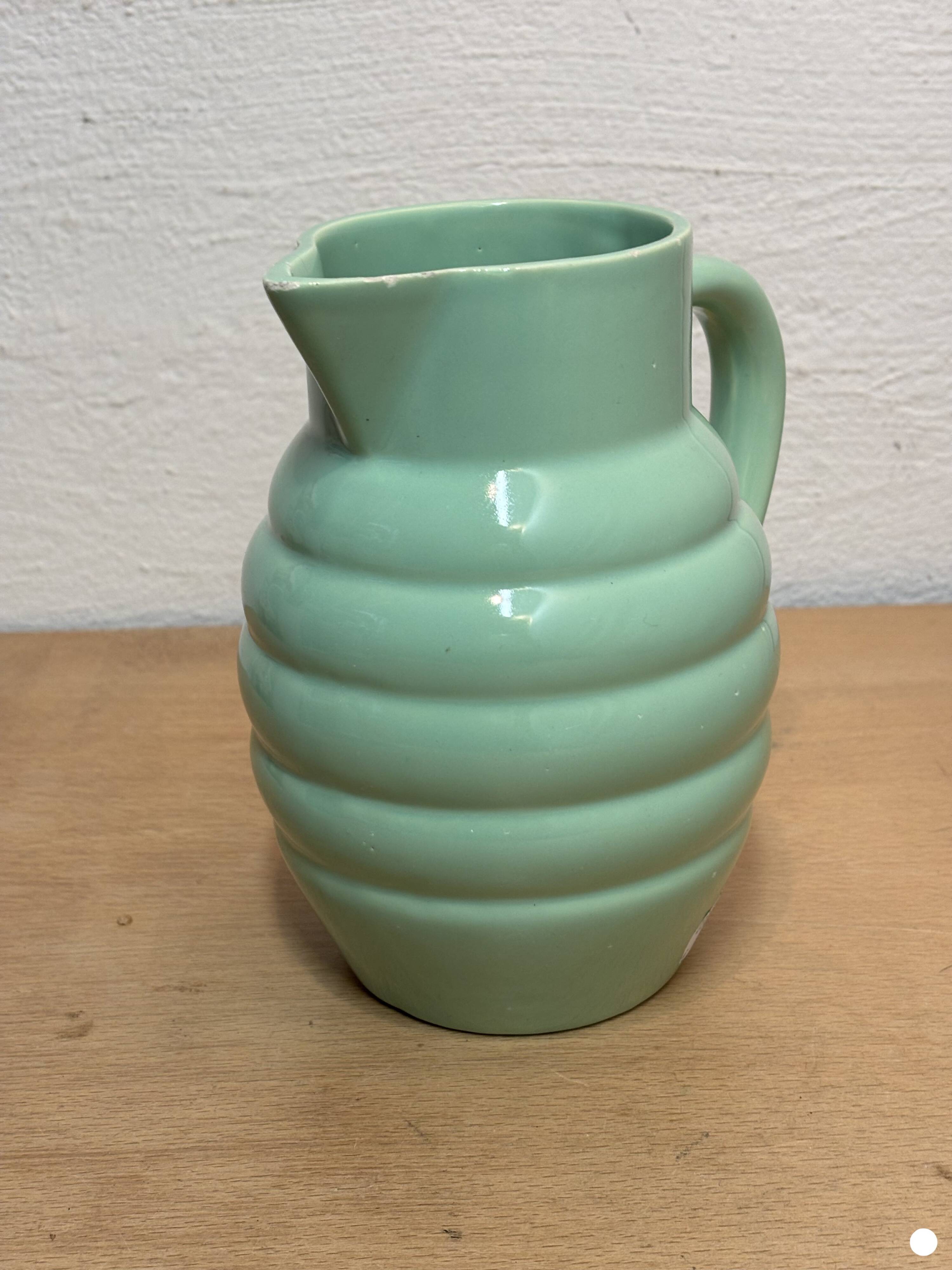 Green earthenware pitcher