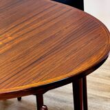 Extendable dining room table and chairs (by Kristian Solmer Vedel)