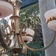 Art Deco chandelier with 4 lights in bronze and opaline.