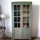 Art Deco library in earthy green