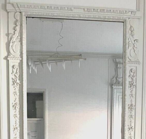 Louis XVI style mirror in wood and carved stucco 20th century