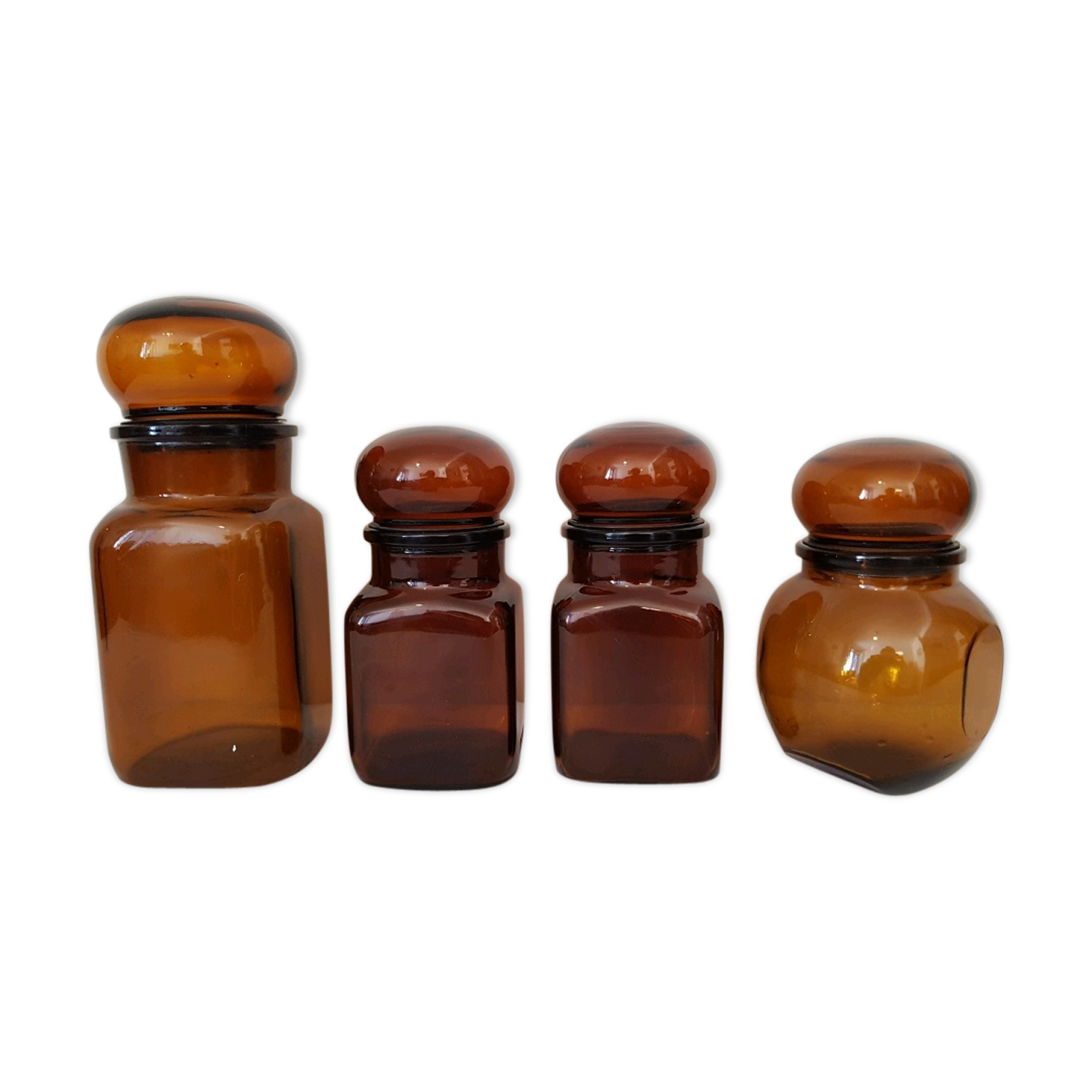 4  amber glass jars  70