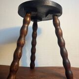 Round wooden tripod stool
