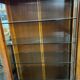 Vitrine en merisier 2 portes / 2 tiroirs