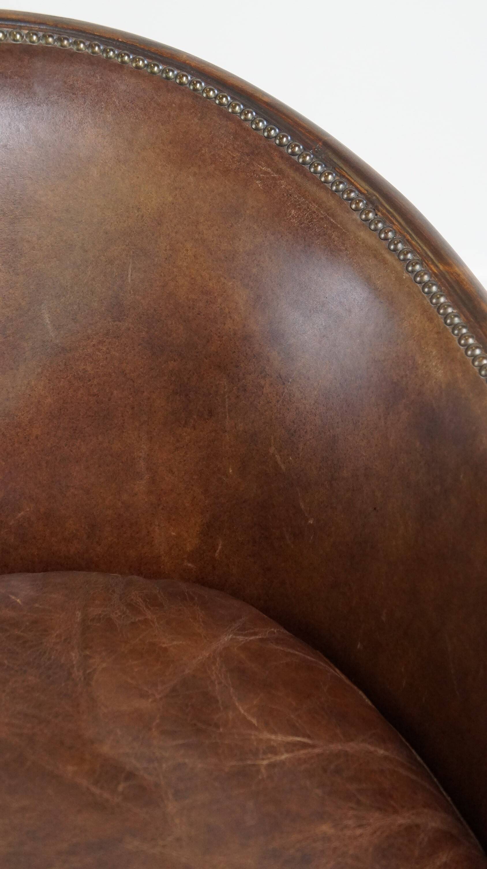 Set of 2 club chairs/armchairs in dark cognac leather