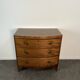 English commode from the George III Regency period, bombe shape in mahogany veneer.