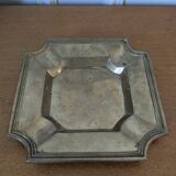 Brass pocket emptier