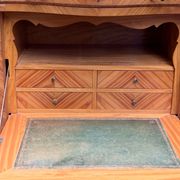Old French secretary in bronze and wood marquetry.