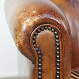 Set of 2 cognac-colored sheepskin club chairs with colorful fabric cushions