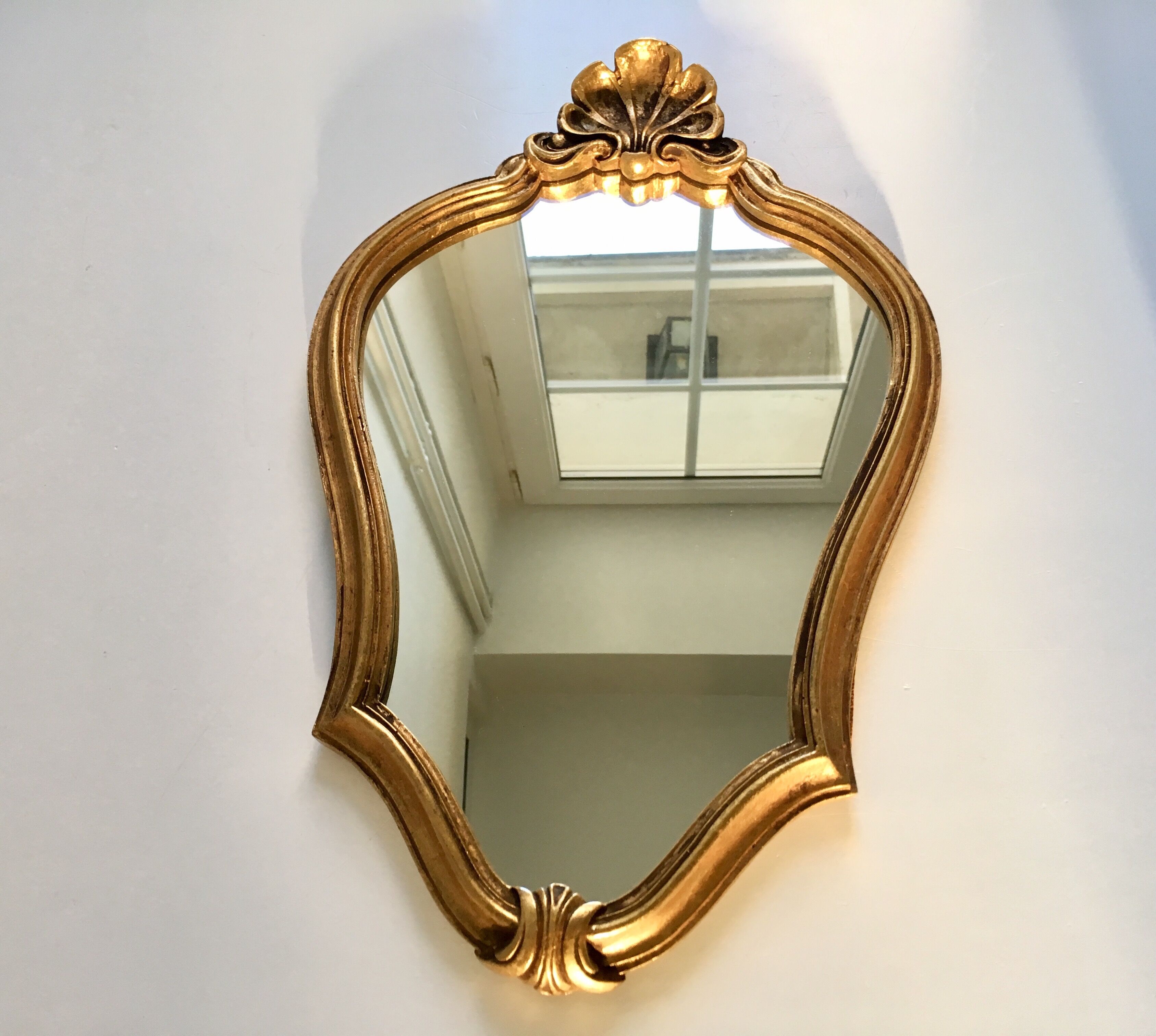 Mirror rocked carved and gilded wood 30x45cm