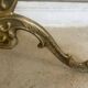 Freestanding brass coat rack