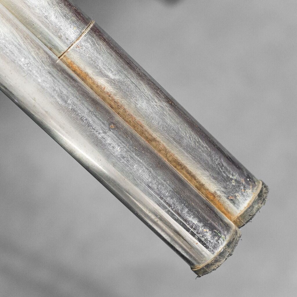 Pair of tubular armchairs double face '70