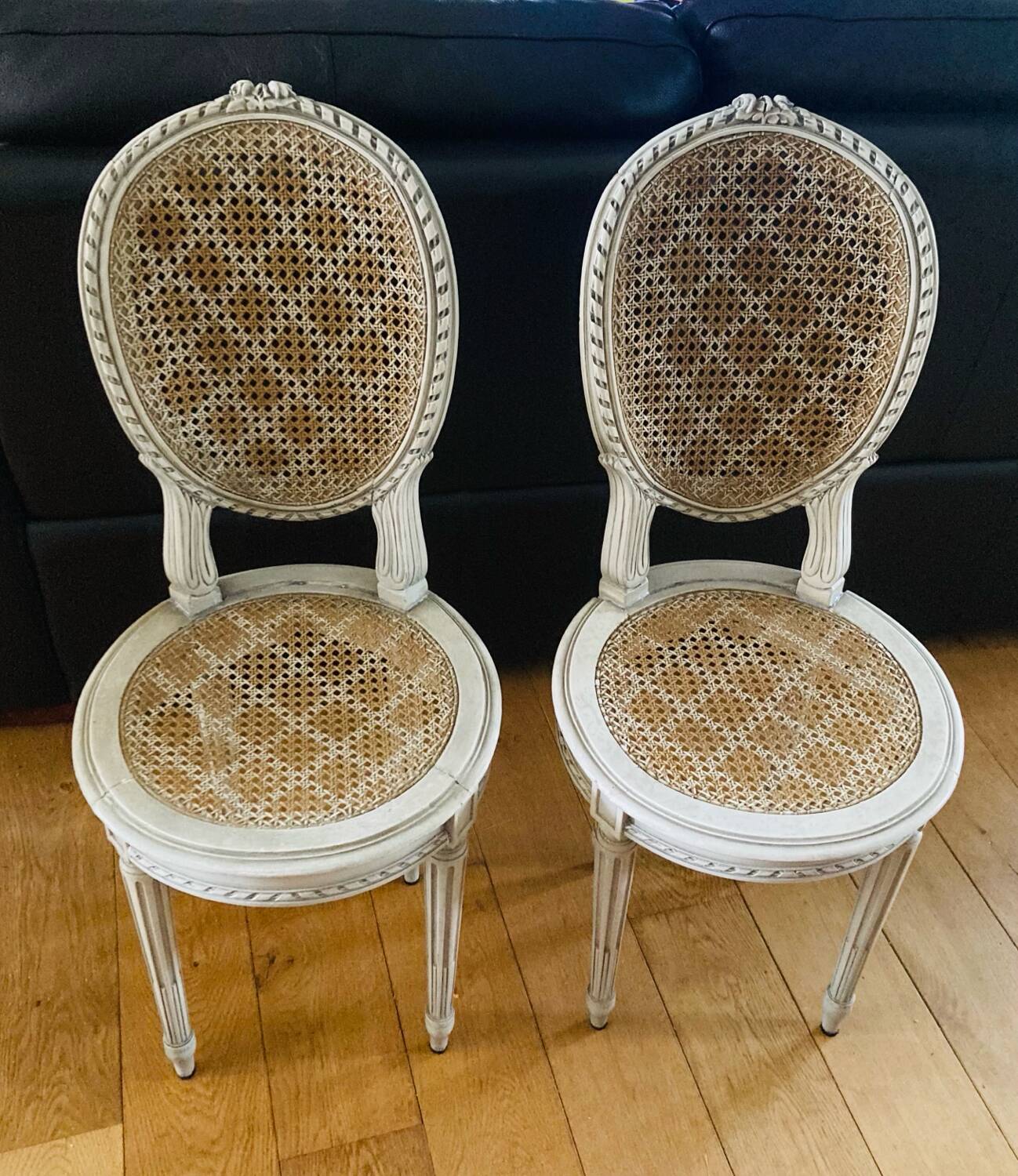 Pair of Louis XVI chairs from the late 19th century with checkerboard caning