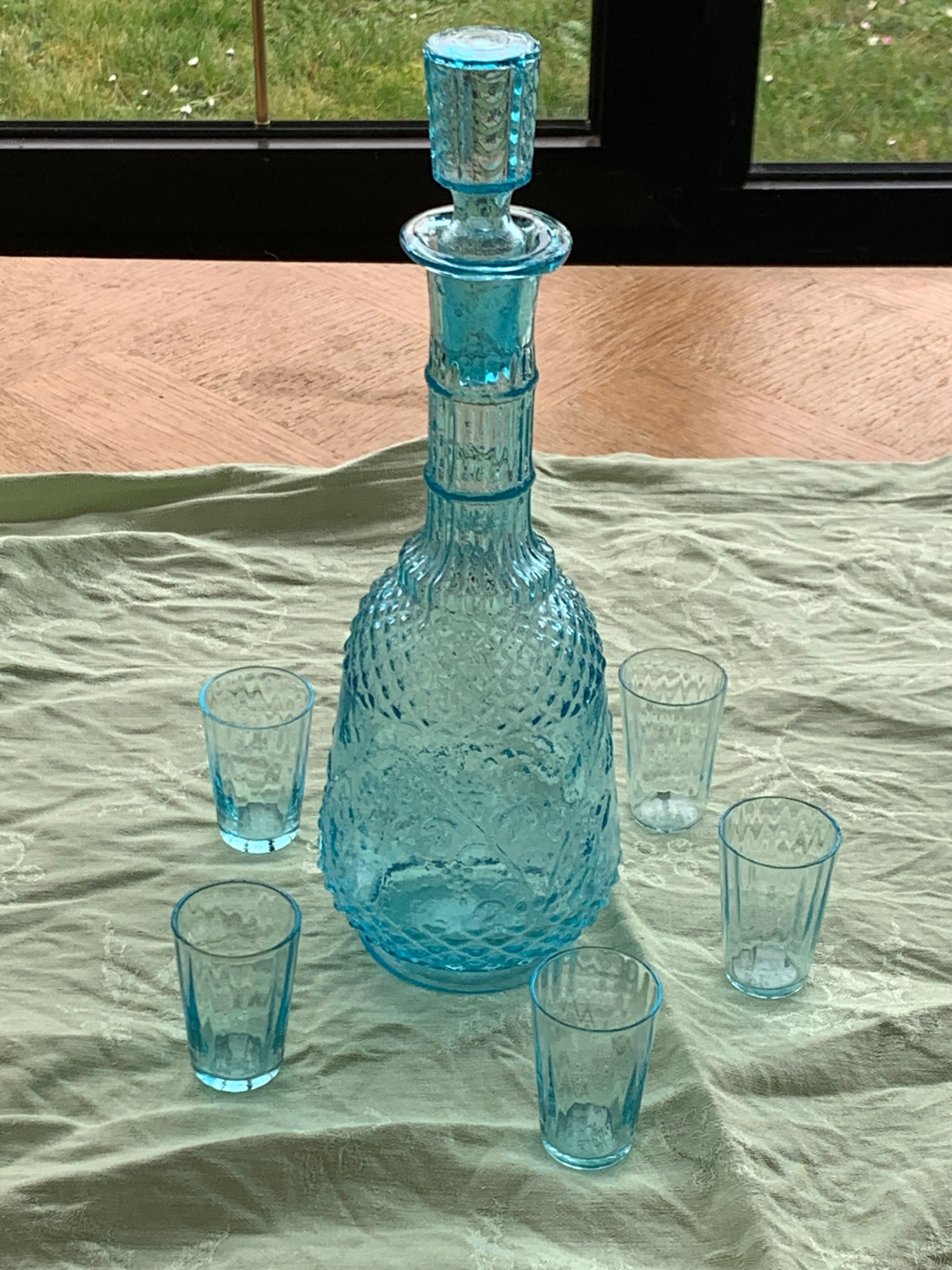 Carafe and 5 old blue glass liqueur glasses
