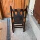 Handcrafted brown leather armchair, dark wood frame, circular pattern - 1970s.