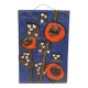 Ceramic relief in attractive blue with a motif of white/red flowers.