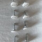 white ceramic door knobs with illustration