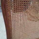 Lit en bois à fond canné