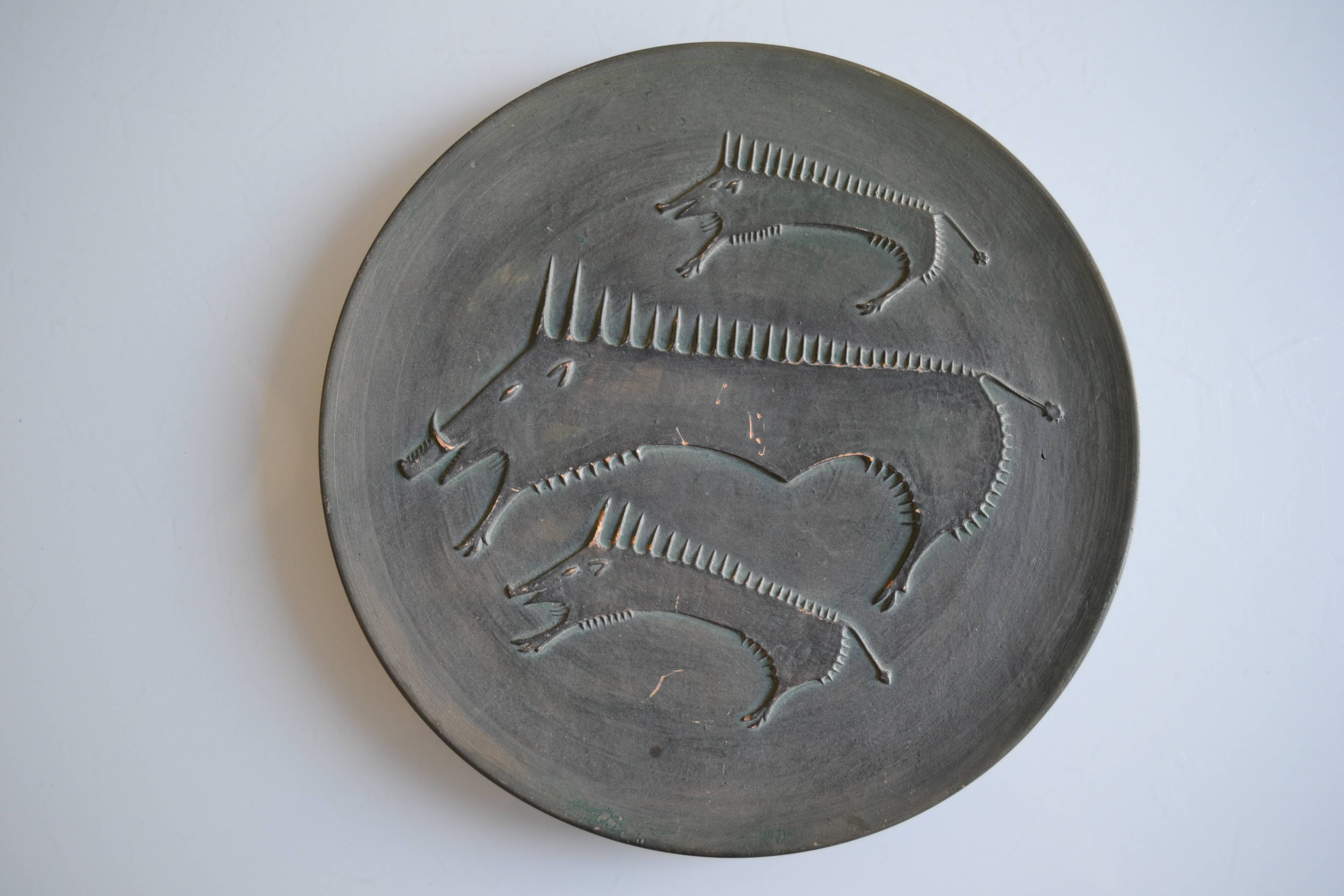 Ceramic wall plate attributed to Wim Mühlendyk