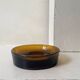 Smoked glass catchall fully tinted in amber.