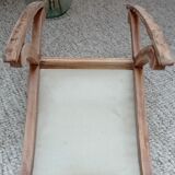 Footrest upholstered in wood