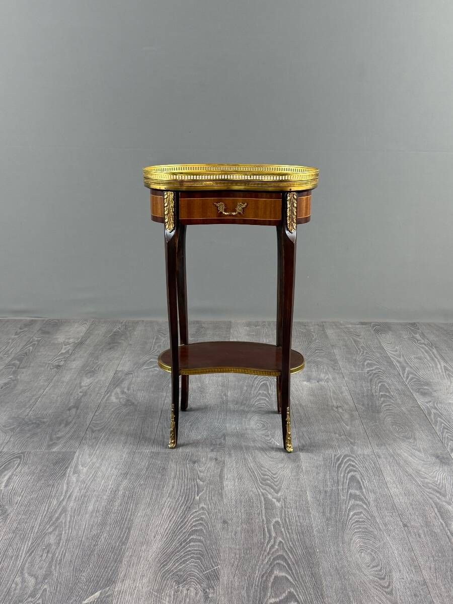 Louis XVI style gueridon in mahogany and gilded bronze, 20th century
