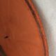 Convex vintage orange mirror
