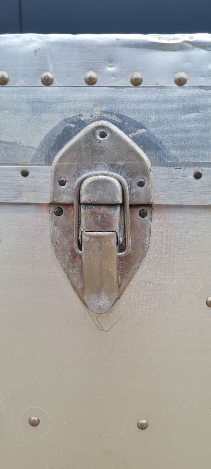 Riveted metal transport trunk
