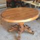 Oval oak table with carved details - known as a hunting table.