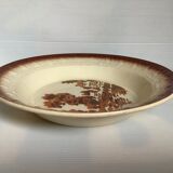 Earthenware dish with wolf mill stencil pattern