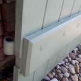 Pair of wooden shutters hanging iron
