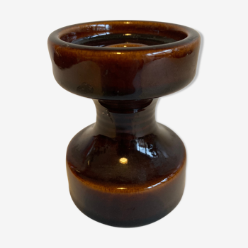 Brown enamelled candlestick