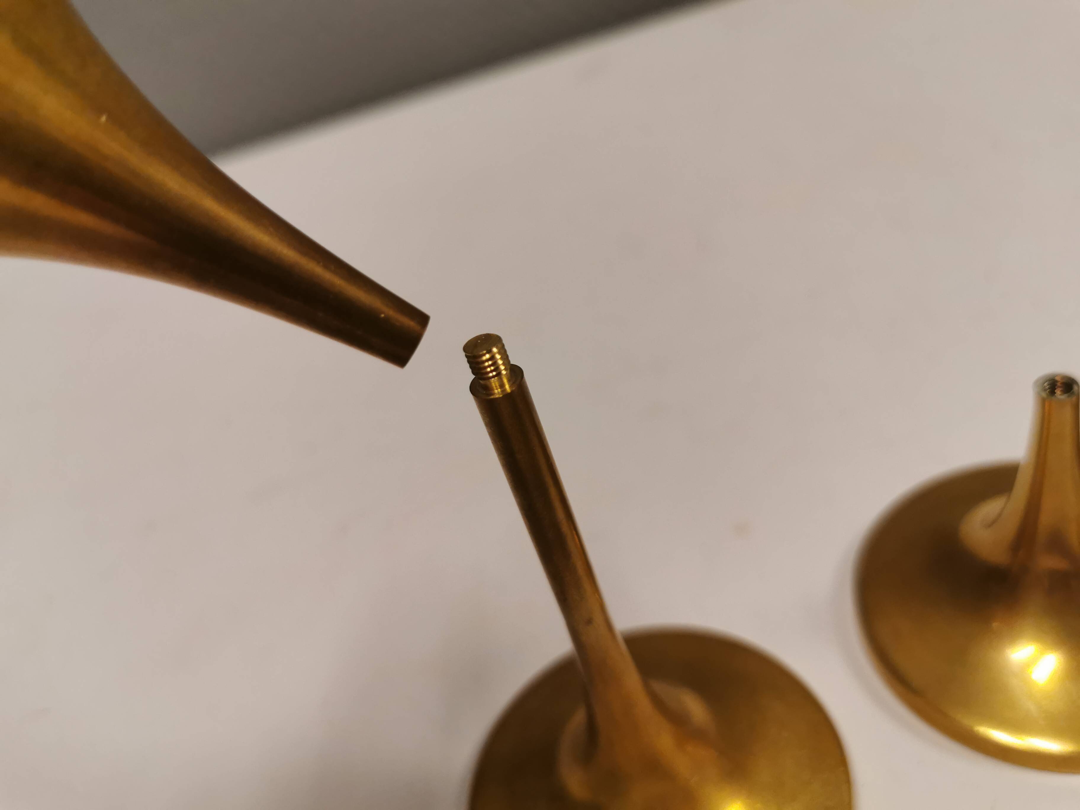A set of candle sticks, in solid brass, made by Malm Denmark in the 1960s