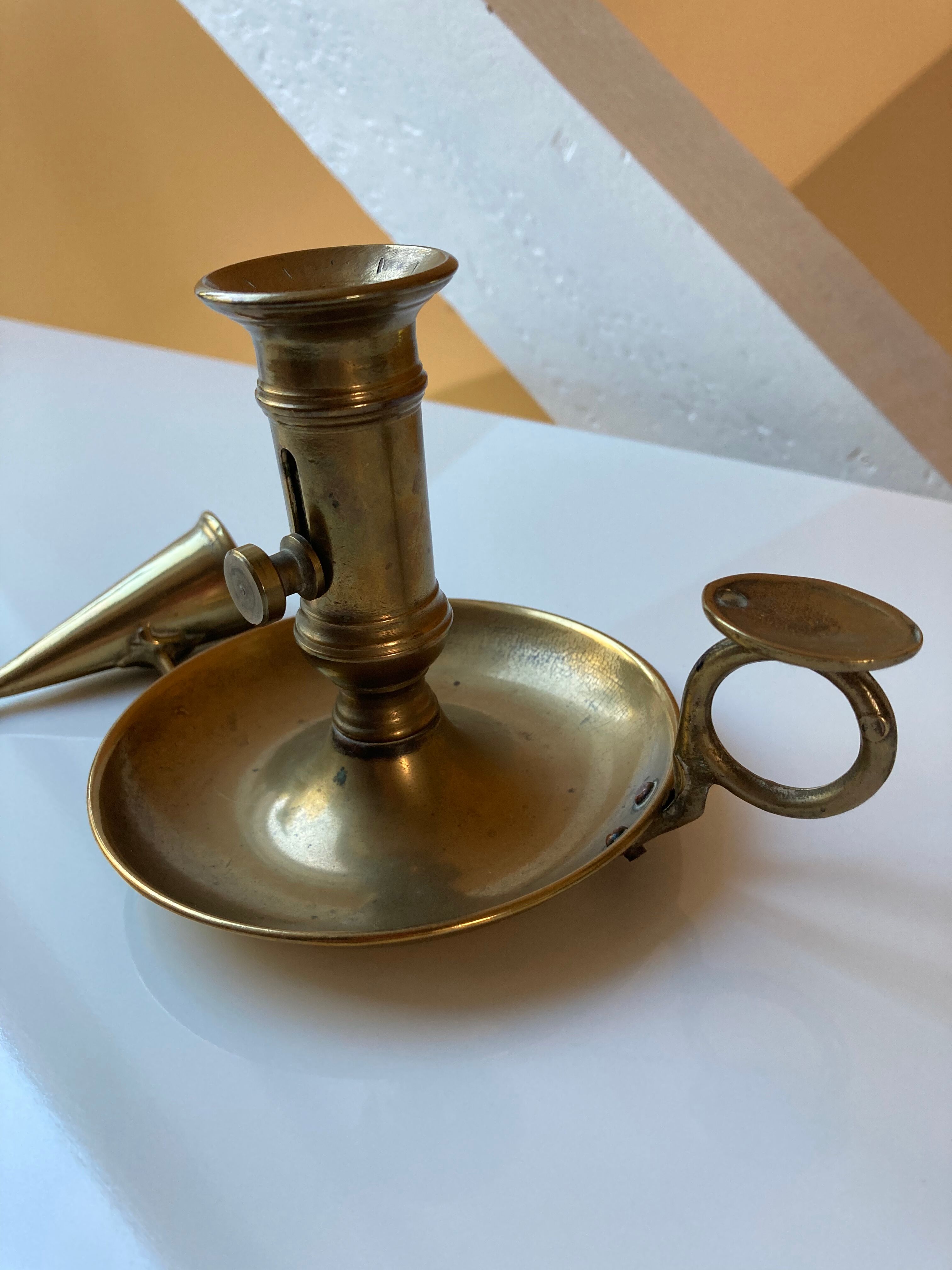Brass hand candle holder