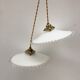 Pair of white opaline suspensions with serrated edges